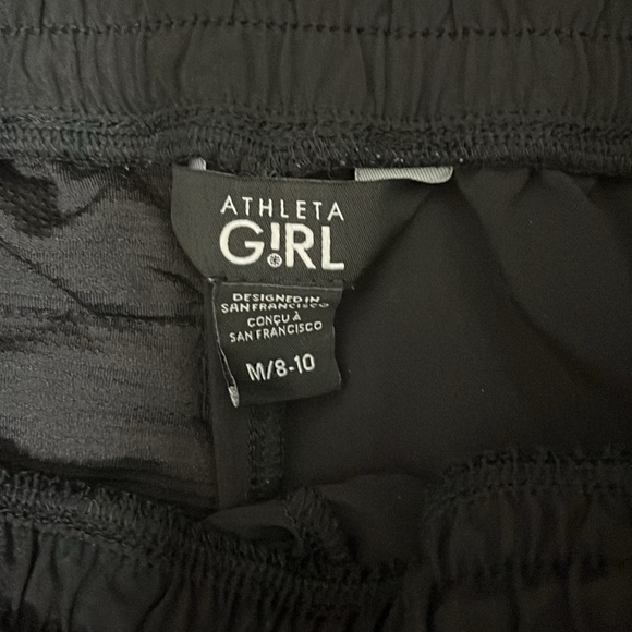 2 pairs (grey and black) size medium (8-10) athleta girl shorts. - Picture 8 of 11